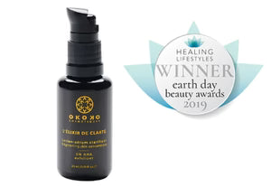 L’Élixir de Clarté by OKOKO Cosmétiques — winner of Best Serum at the Healing Lifestyles Earth Day 2019 Awards, recognized for its brightening, exfoliating, and rejuvenating formula crafted with 5% AHA and intelligent luxury innovation.