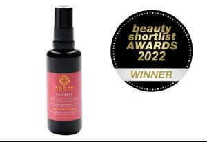 OKOKO Cosmétiques La Perle Urban Defense Spray Serum — award-winning anti-pollution serum with bakuchiol, resveratrol and vitamin C liposome. Protects skin from blue light and urban stress while restoring radiance and balance.