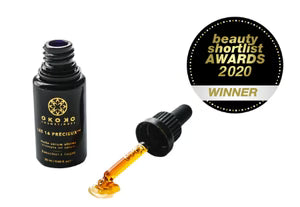 Les 16 Précieux face oil by OKOKO Cosmétiques with bakuchiol and white lupine extract. Winner of Best Day Skincare Product at the Beauty Shortlist Awards, celebrating intelligent, antioxidant-rich, and luxury clean skincare crafted by founder Oyéta Kokoroko.