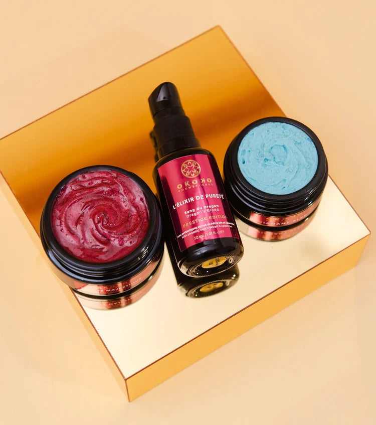 OKOKO Cosmétiques luxury skincare products — Essence Rare red mask, L’Élixir de Pureté serum, and Diamant Bleu blue cream — featured in The Founder’s Ritual by Oyéta Kokoroko at Maison OKOKO, Vancouver